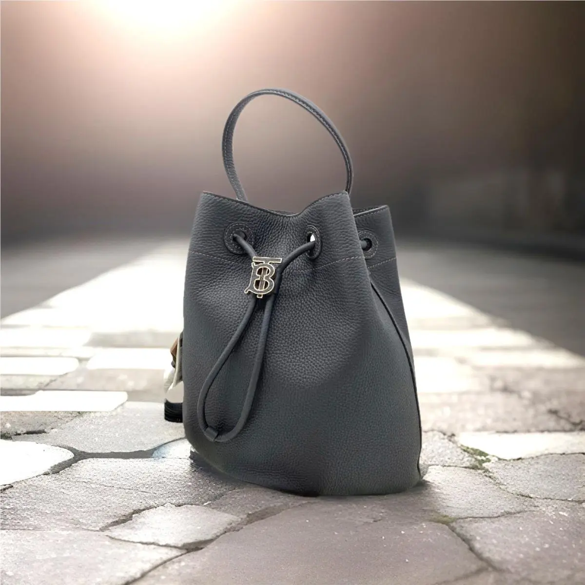 Burberry TB Plaque Drawstring Pebbled Leather Bucket Crossbody In Black