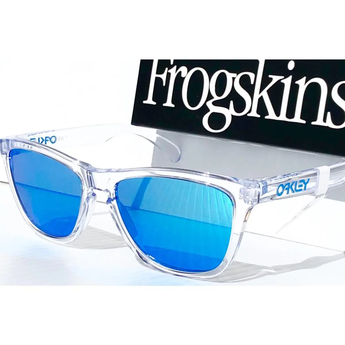 Frogskins Clear and Blue Polarized Galaxy Blue Lens Sunglass 9013 by Oakley