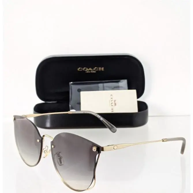Sunglasses HC 7151 900511 Shiny Light Gold 63mm by Coach