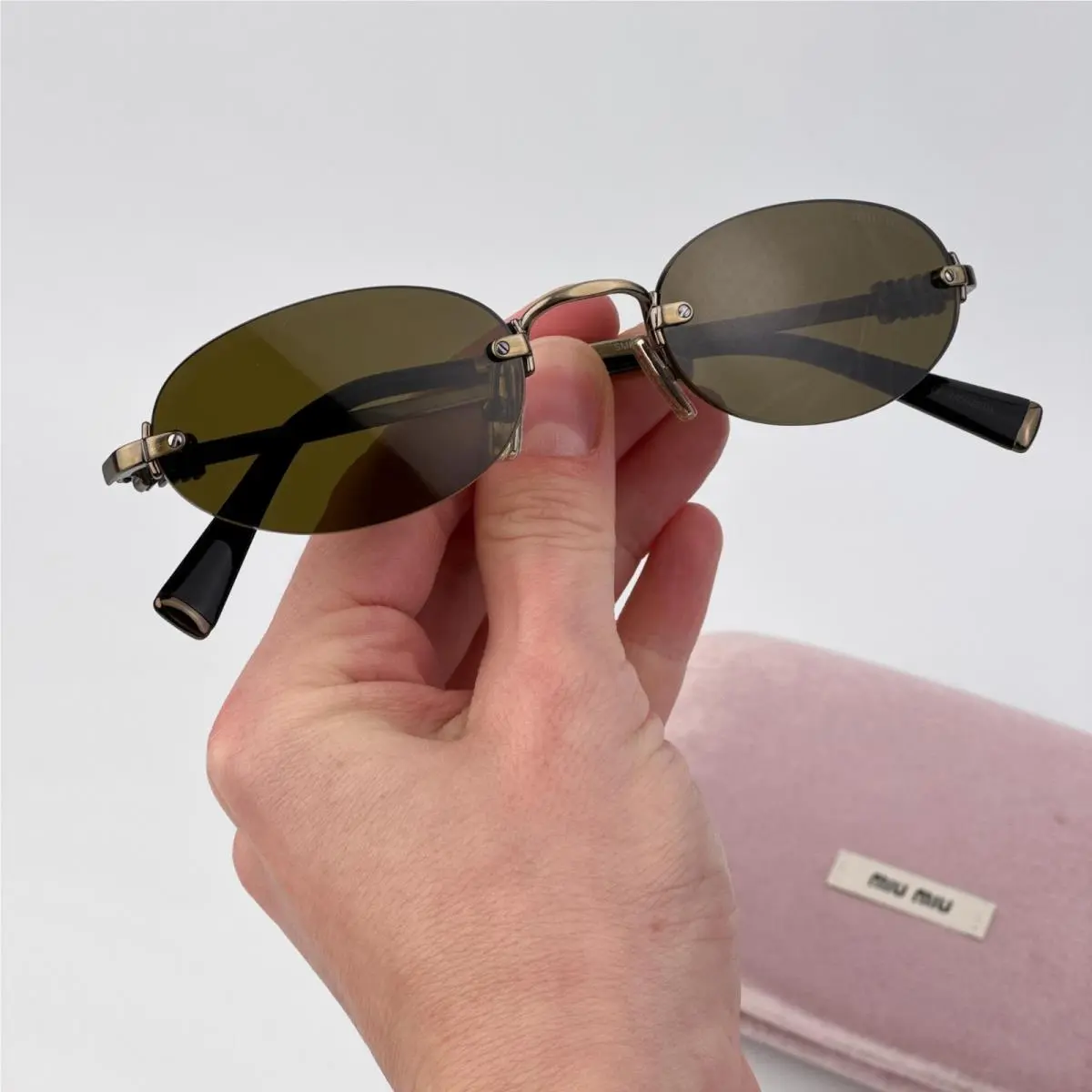 Women Sunglasses Old Gold Brown Oval MUA54S 26C09Z by Miu Miu