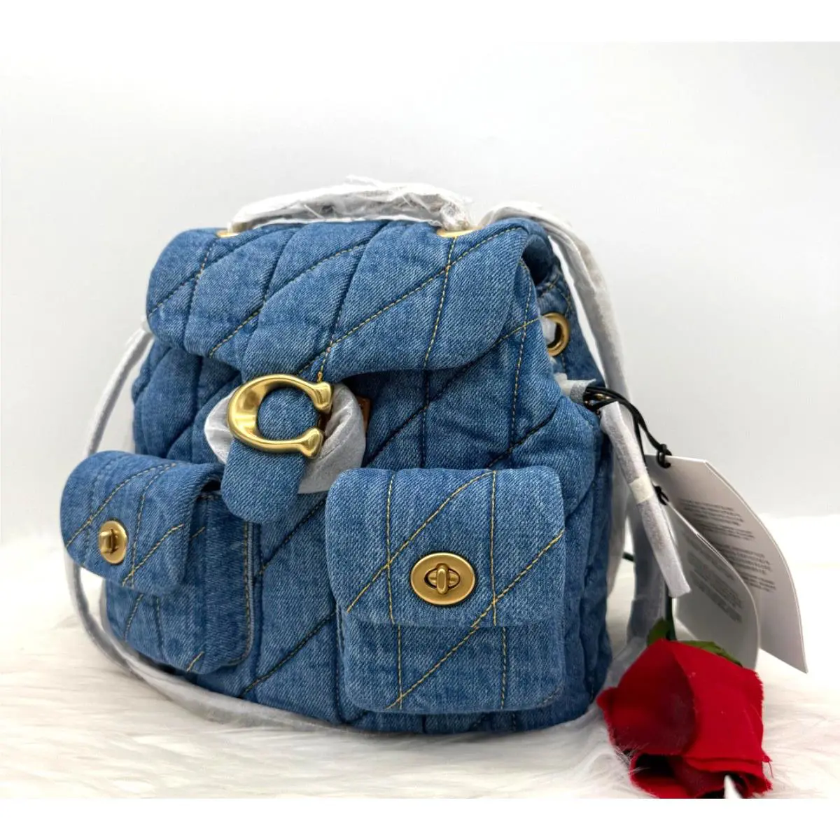 Coach Women s Tabby Quilted Denim Backpack In Indigo/ Brass
