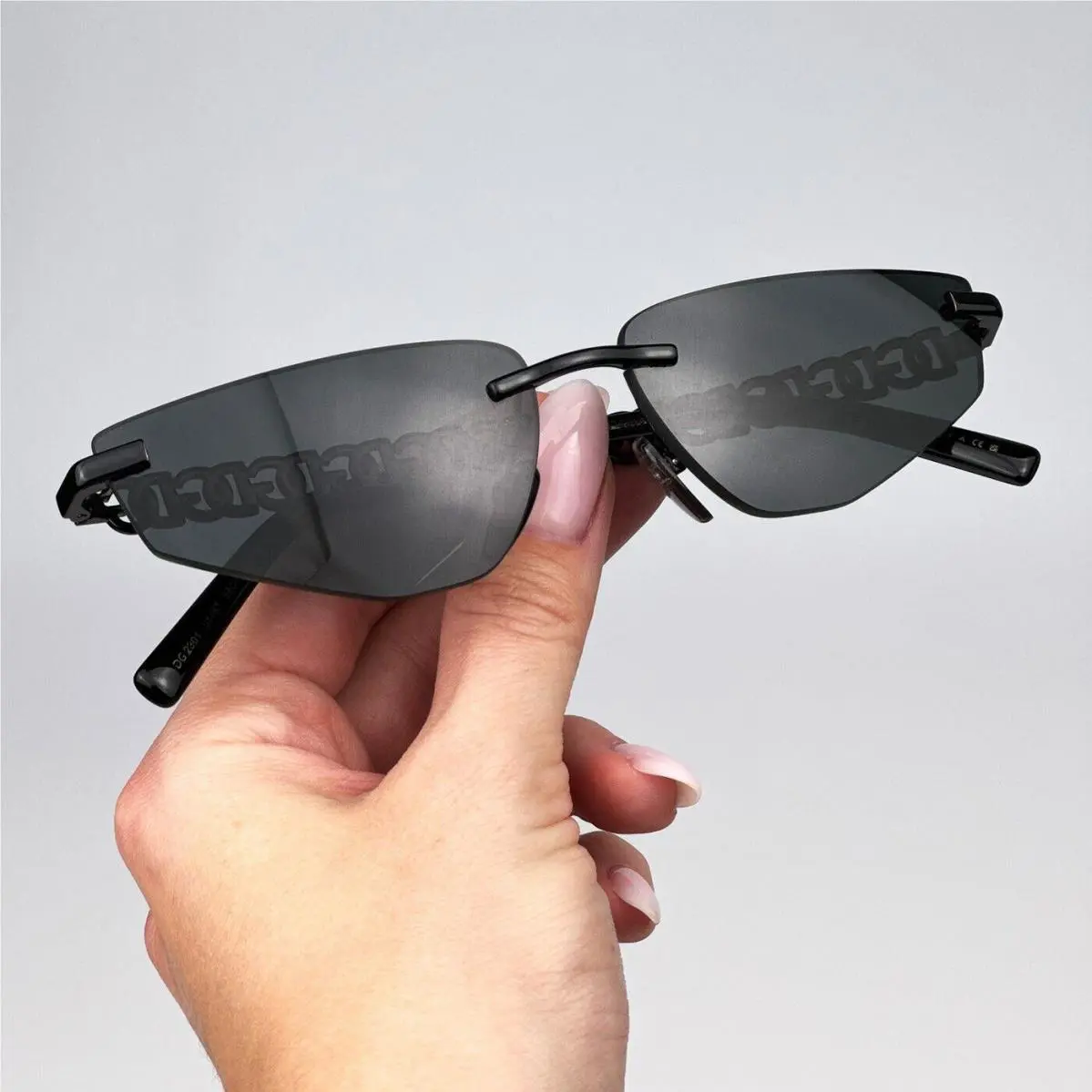 Dolce Gabbana D G Women Sunglasses Black Grey Rimless Rectangle DG2301 Essentials 01/87 by Dolce & Gabbana