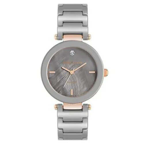Anne Klein Women`s Diamond Dial Ceramic Bracelet Watch AK/1018TPRG