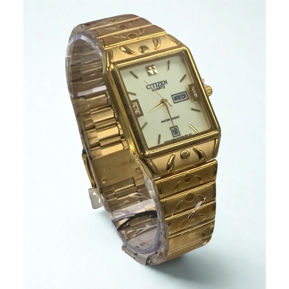 Citizen Gold-tone Quartz Day-date Ivory Dial Watch – R1299 Series