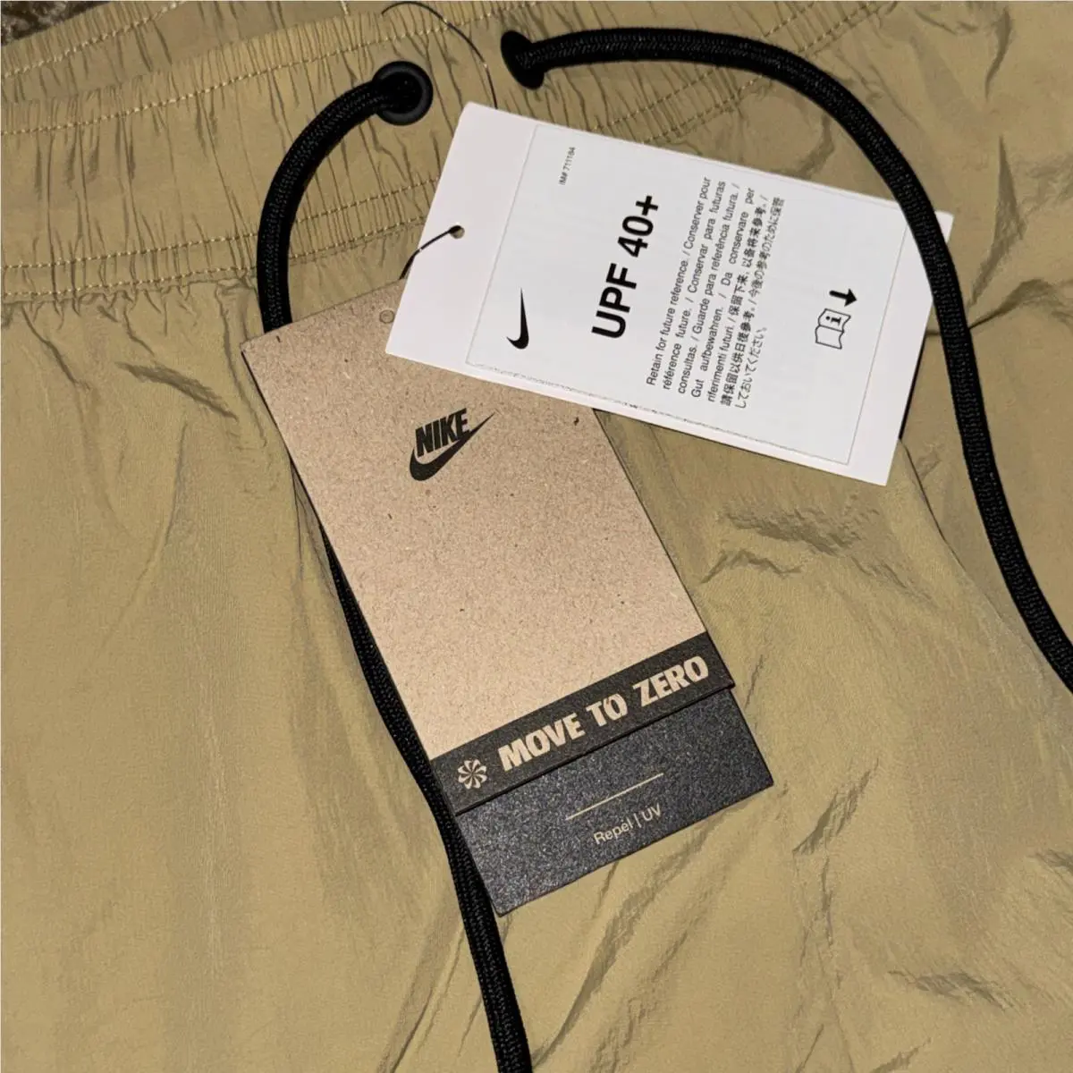 Nike clothing - Parachute Beige (UPC: 0197859980963) 1