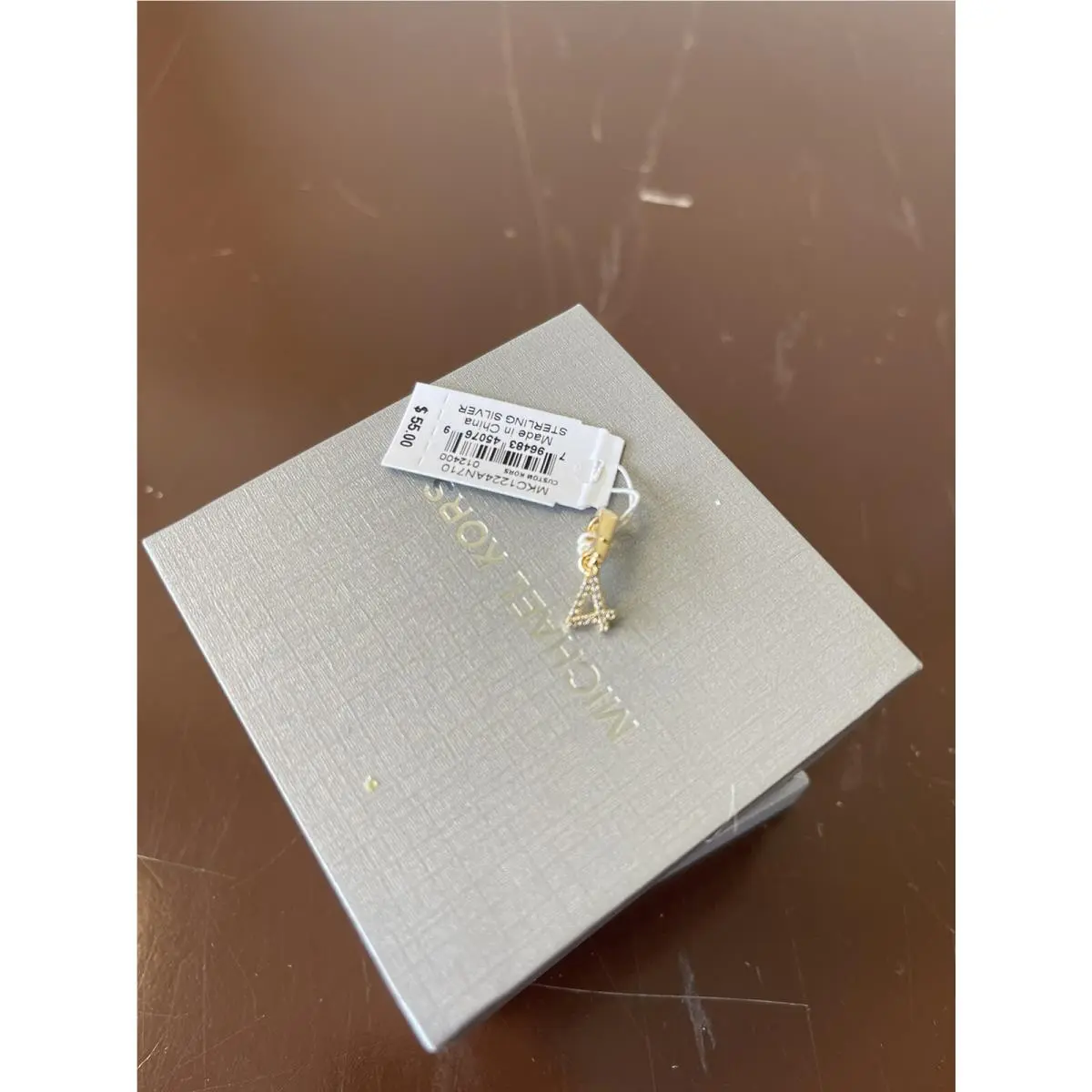 Michael Kors Gold Tone Pendant