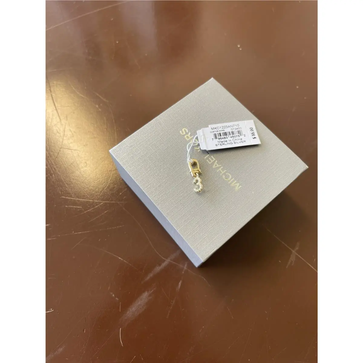 Michael Kors Gold Tone Pendant