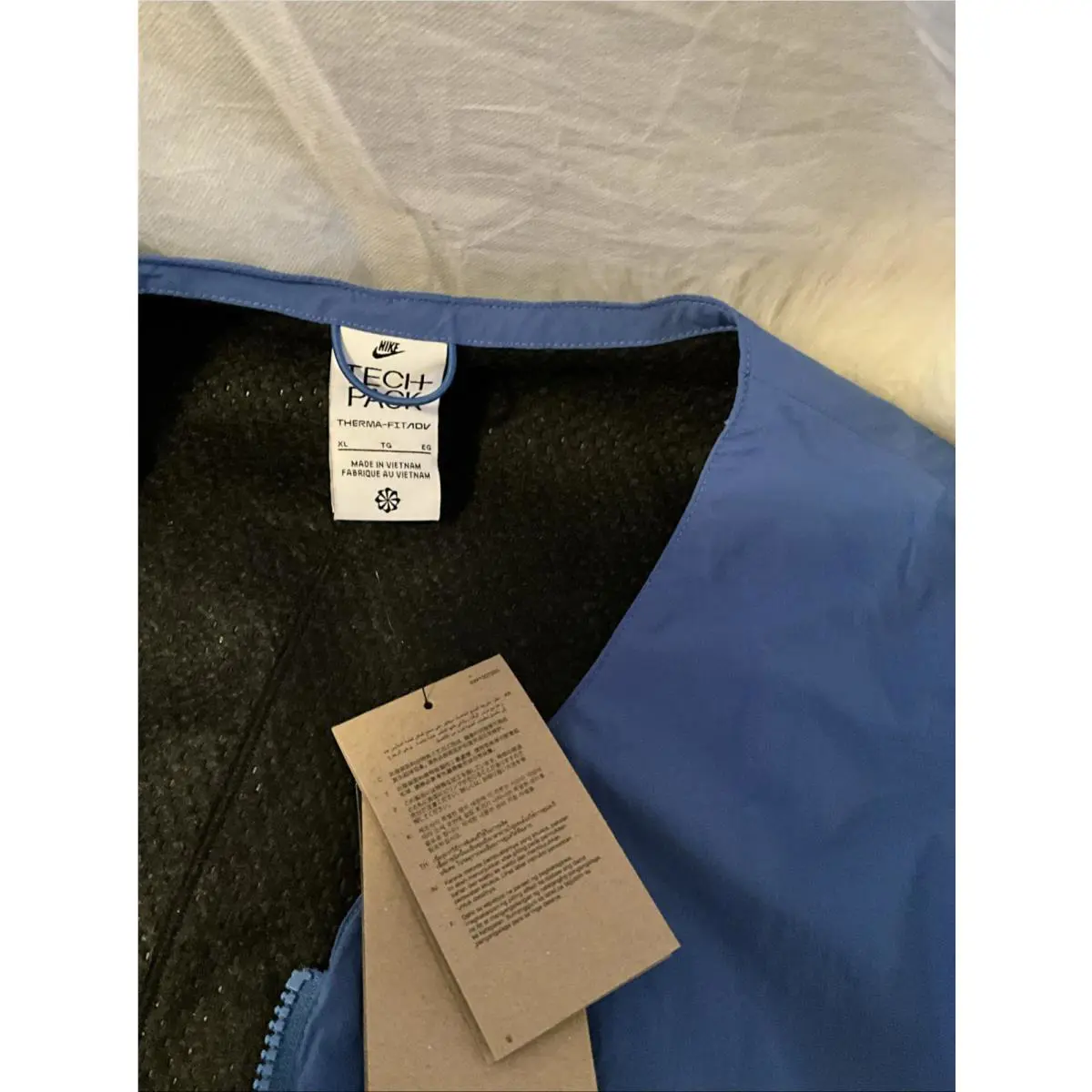Nike clothing - Nike Sportswear Tech Pack Therma-Fit ADV Forward-Lined Vest - FQ3863402 - Blue (UPC: 0196976188849) 1