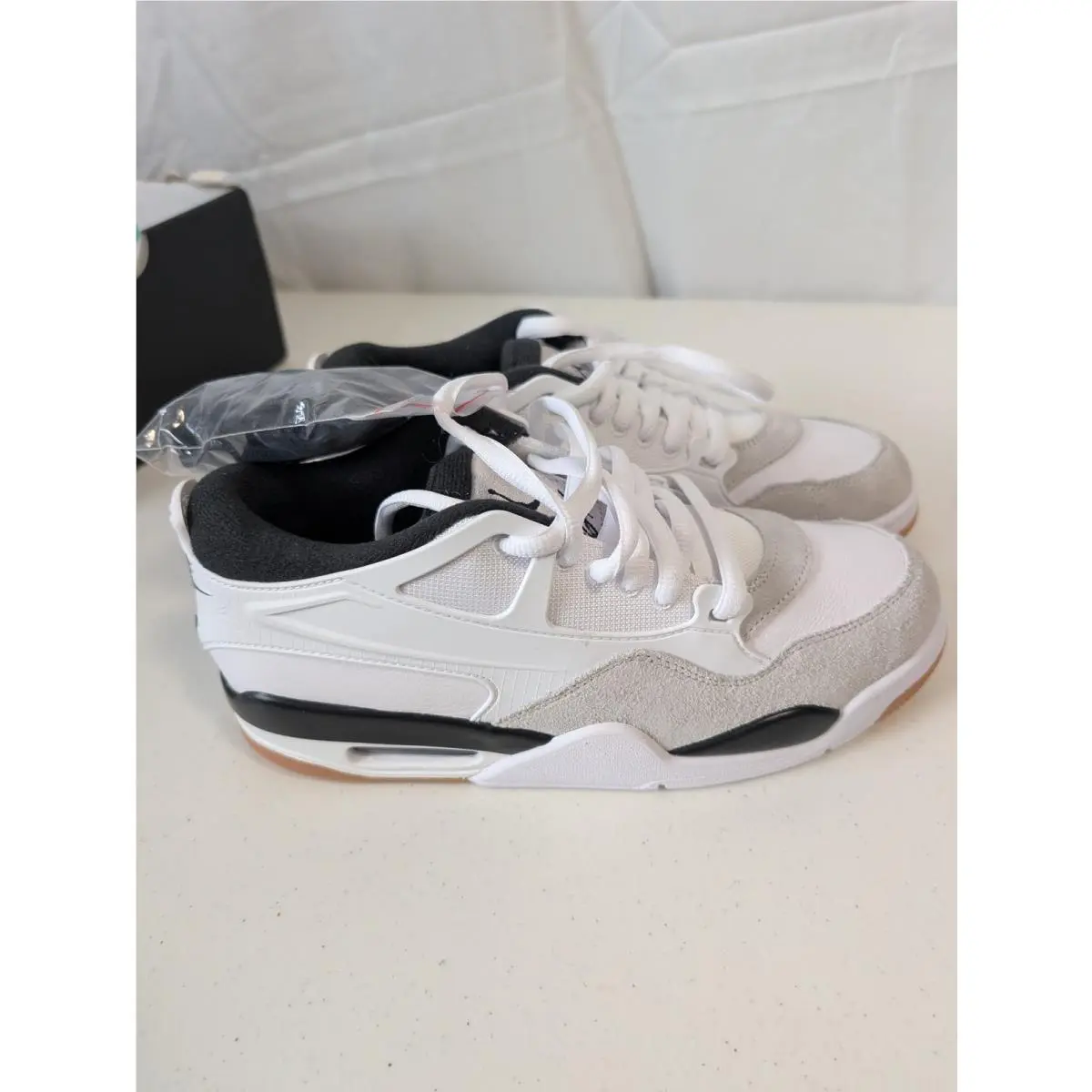 Nike shoes - Air Jordan 4 RM - Air - FQ7939-110 - White, Black, Grey, Gum 1