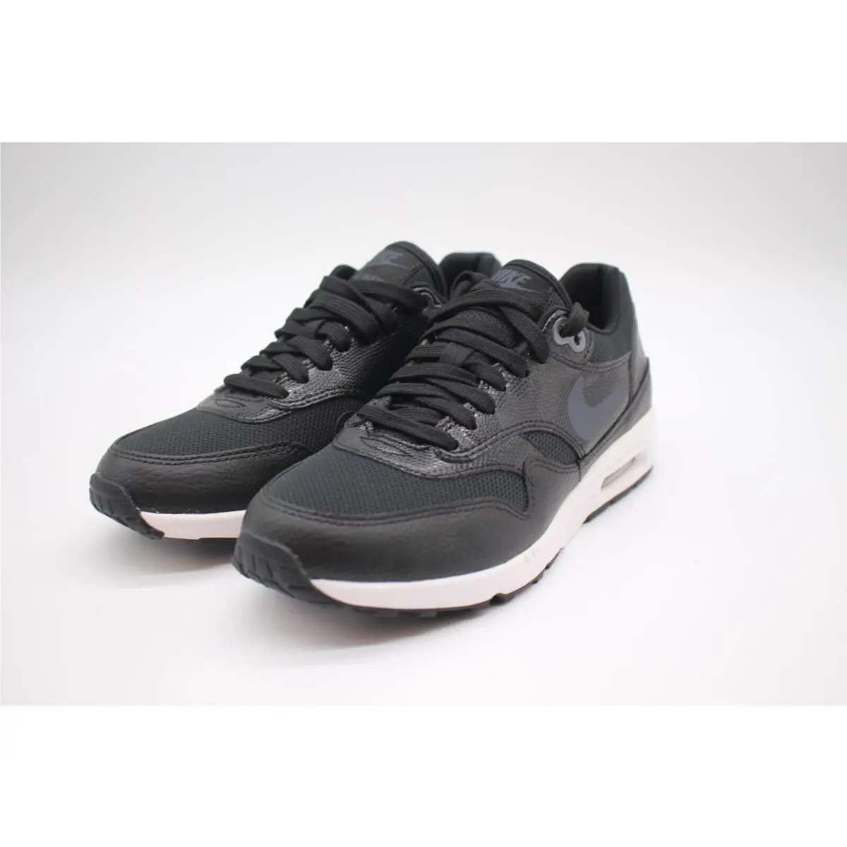 Nike shoes - Black (UPC: 886737057599) 0
