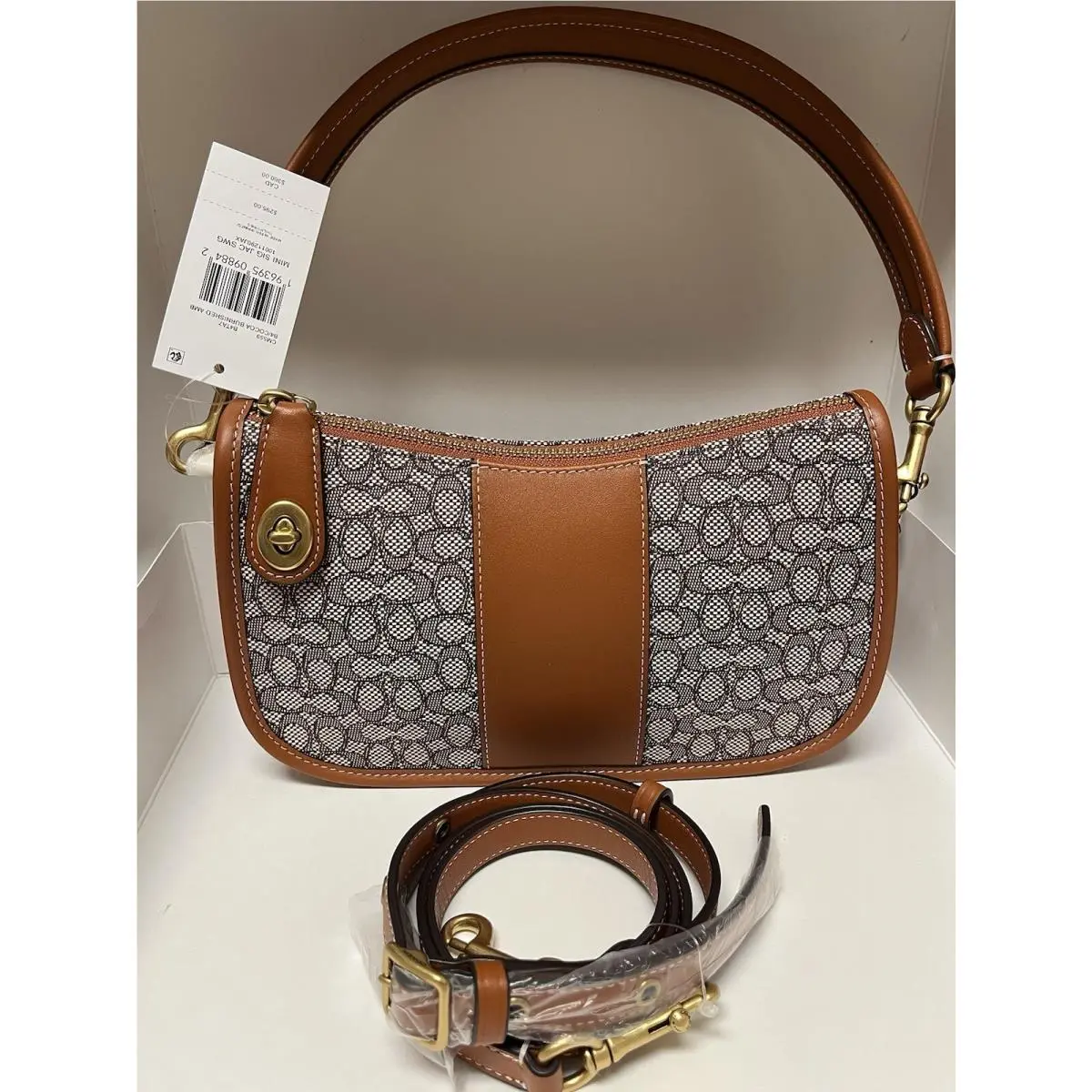 Coach Swinger Leather Bag In Micro Signature Jacquard CM559