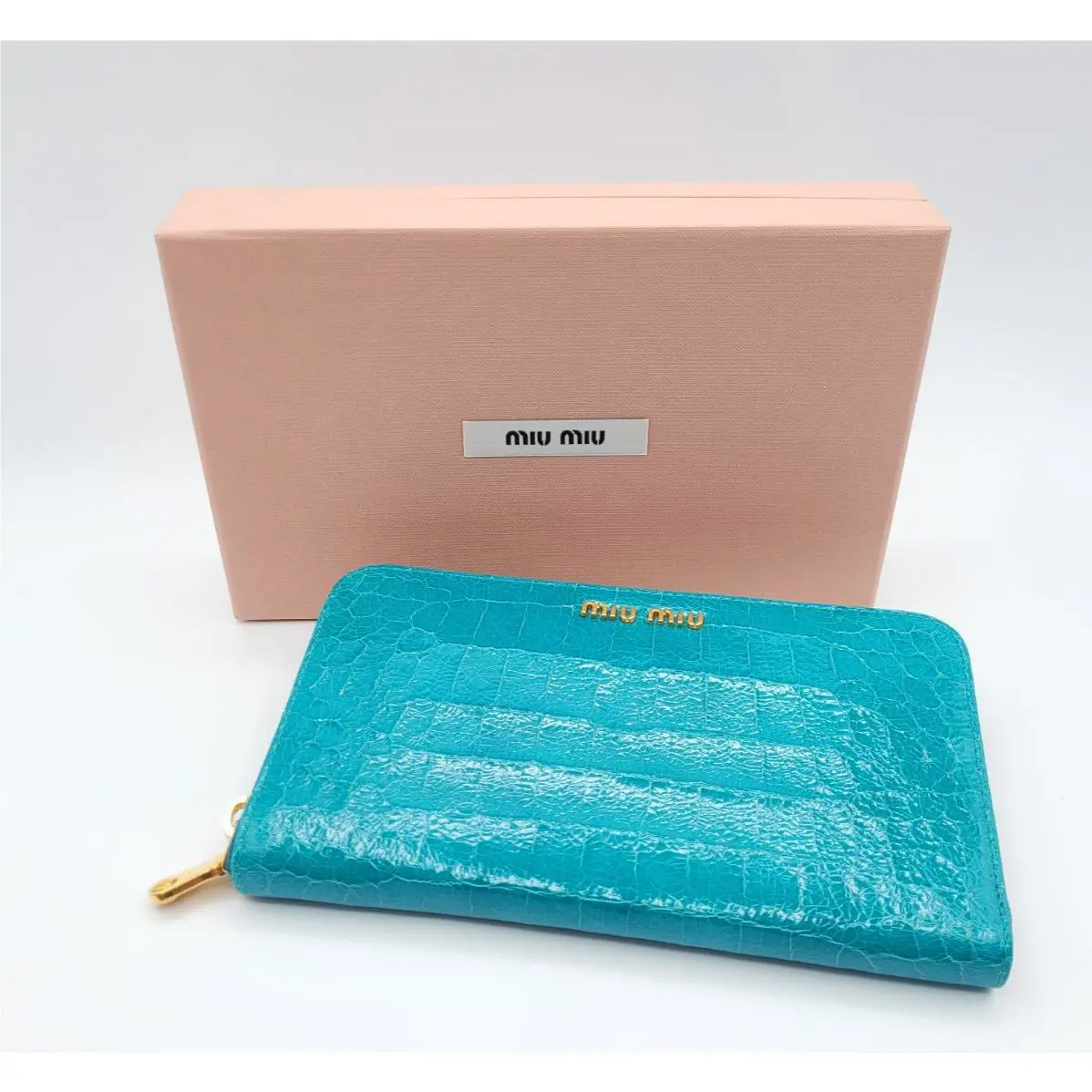 Miu Miu Crocodile Embossed Saint Cocco Lux Zip Around Wallet Turchese