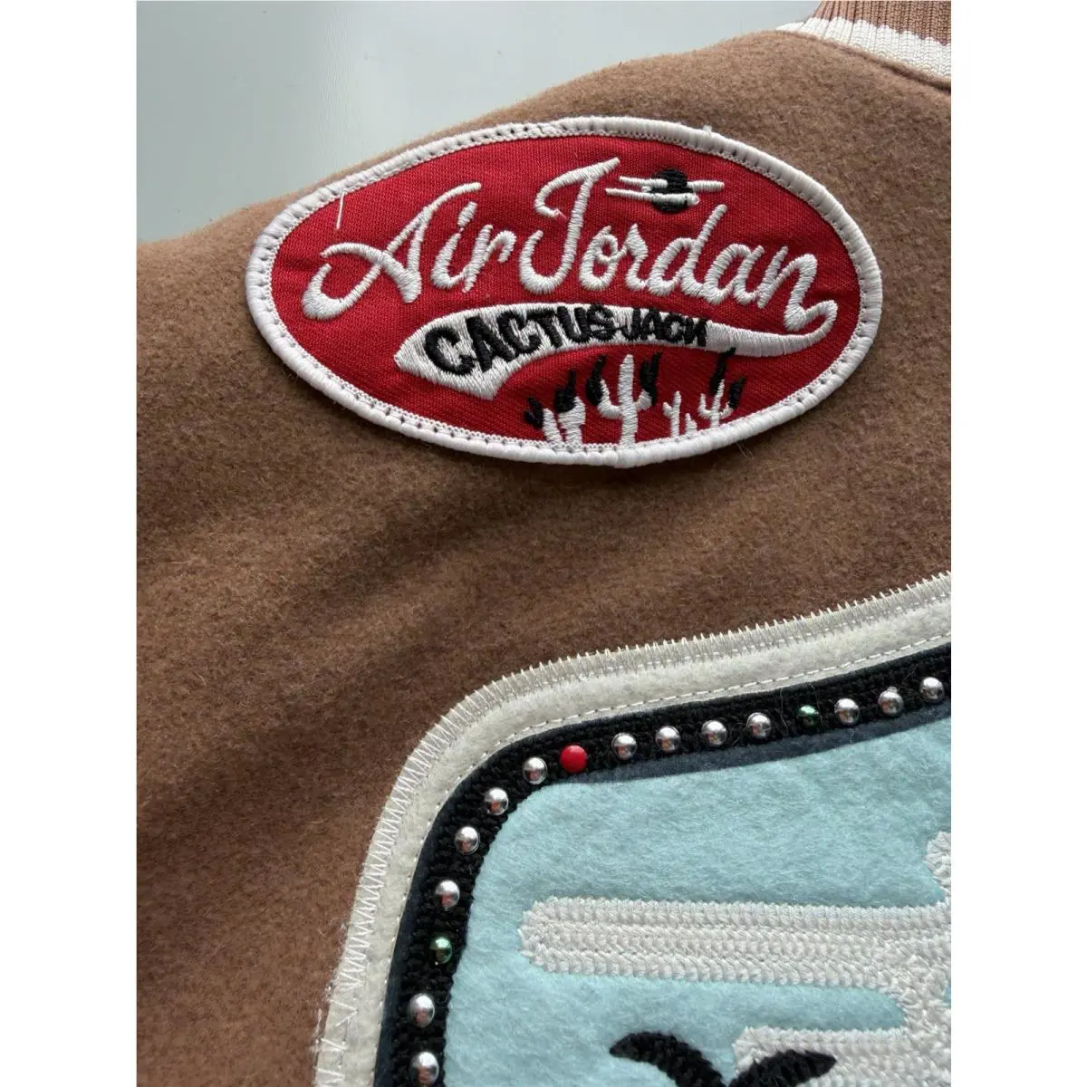 Nike clothing - Travis Scott × Jordan Varsity Jacket - DO4103-256 - Antique Brown/Cream (UPC: 190866317975) 14