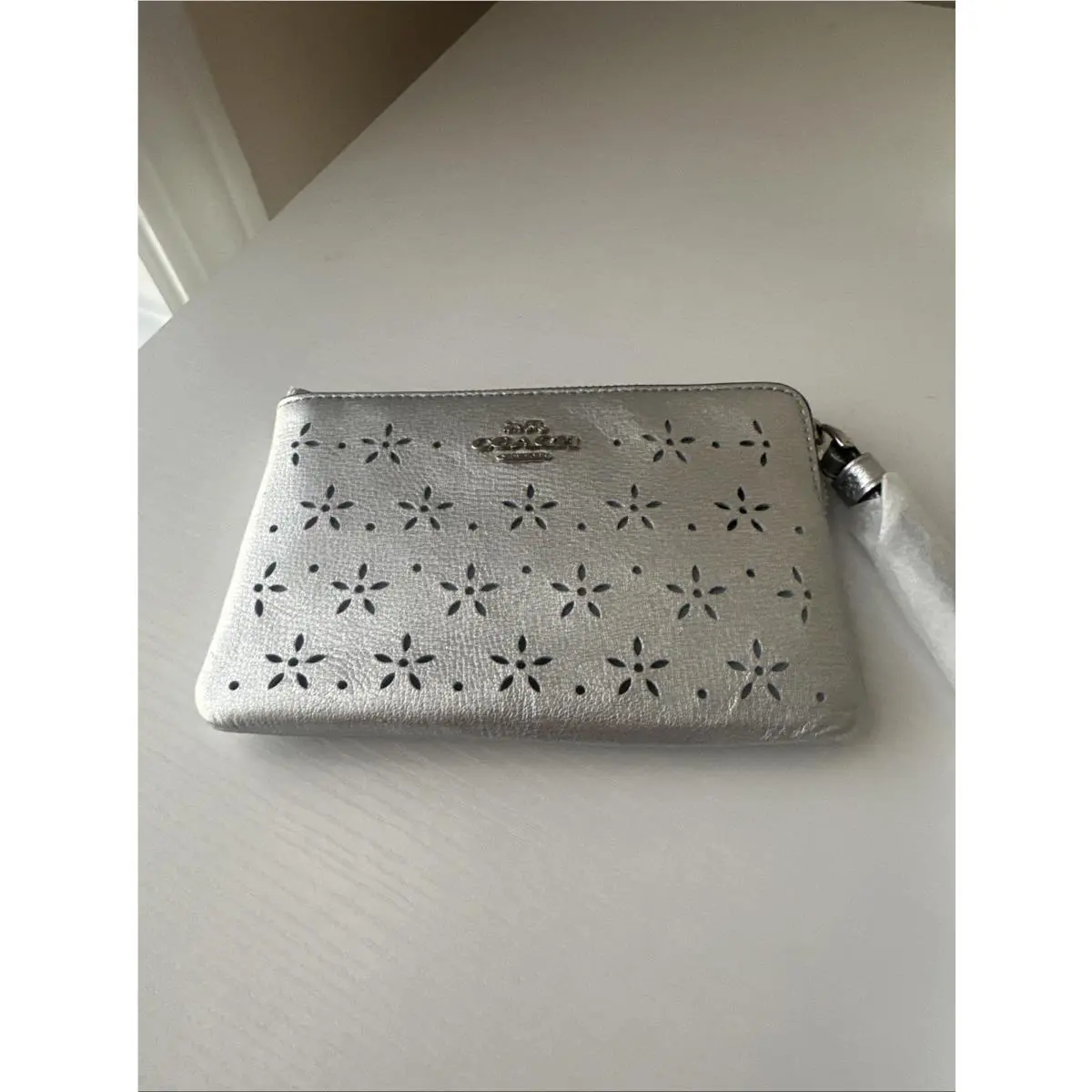 Coach Corner Zip Leather Wristlet Perforated Flower In Metallic Silver F67608