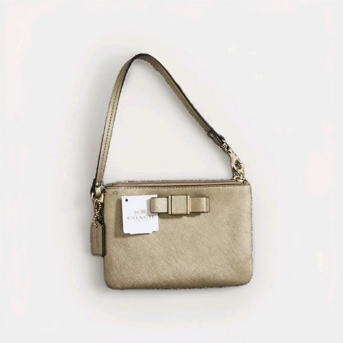 Coach Darcy Bow Saffiano Leather Wristlet Metallic Gold Bag Charm Logo