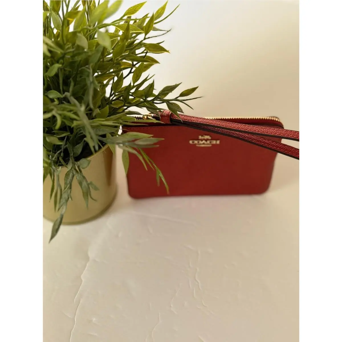 Coach Corner Zip Wristlet – Metallic Currant Crossgrain Leather Wristlet Purse