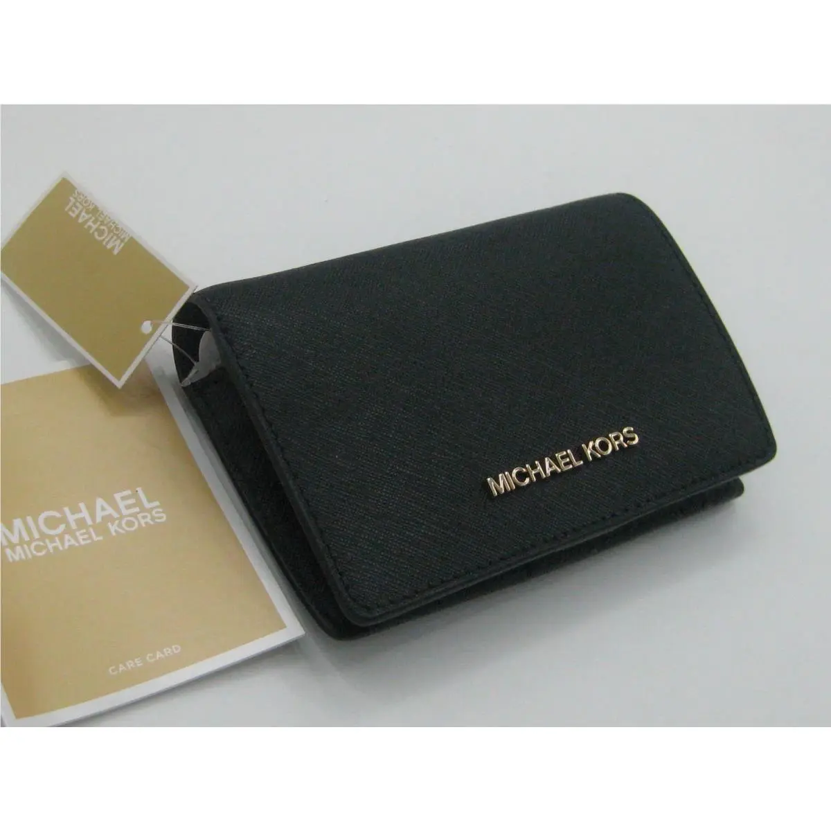 Michael Kors Jet Set Crossgrain Leather Medium Slim Bifold Wallet in Black