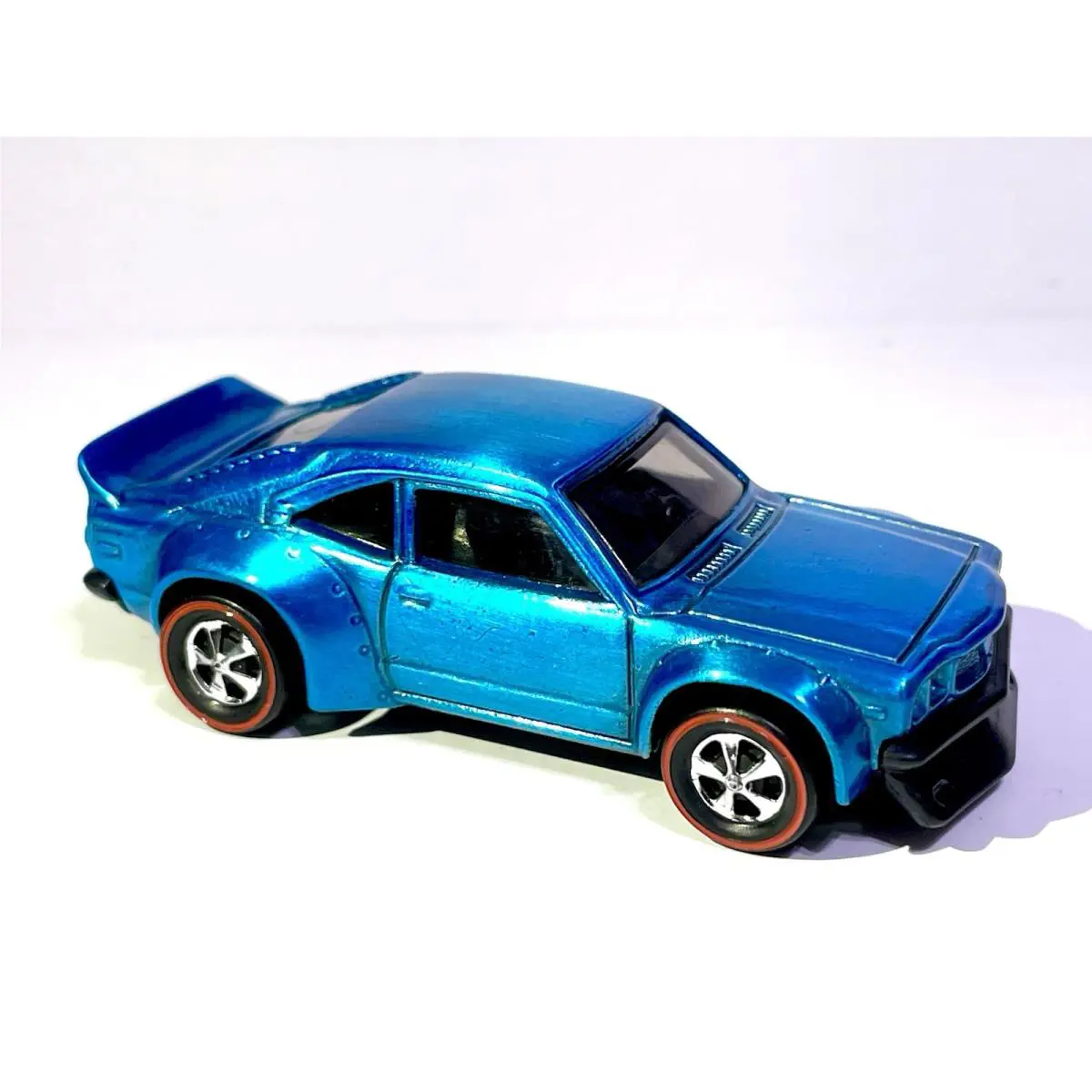 Hot Wheels Mazda RX-3 Custom Made Spectraflame Blue W/ Redlines Diecast Car