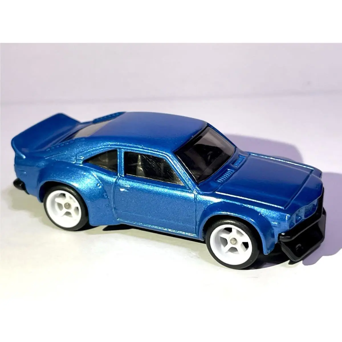 Hot Wheels Mazda RX-3 Custom Made Metallic Blue W/real Riders Diecast Car
