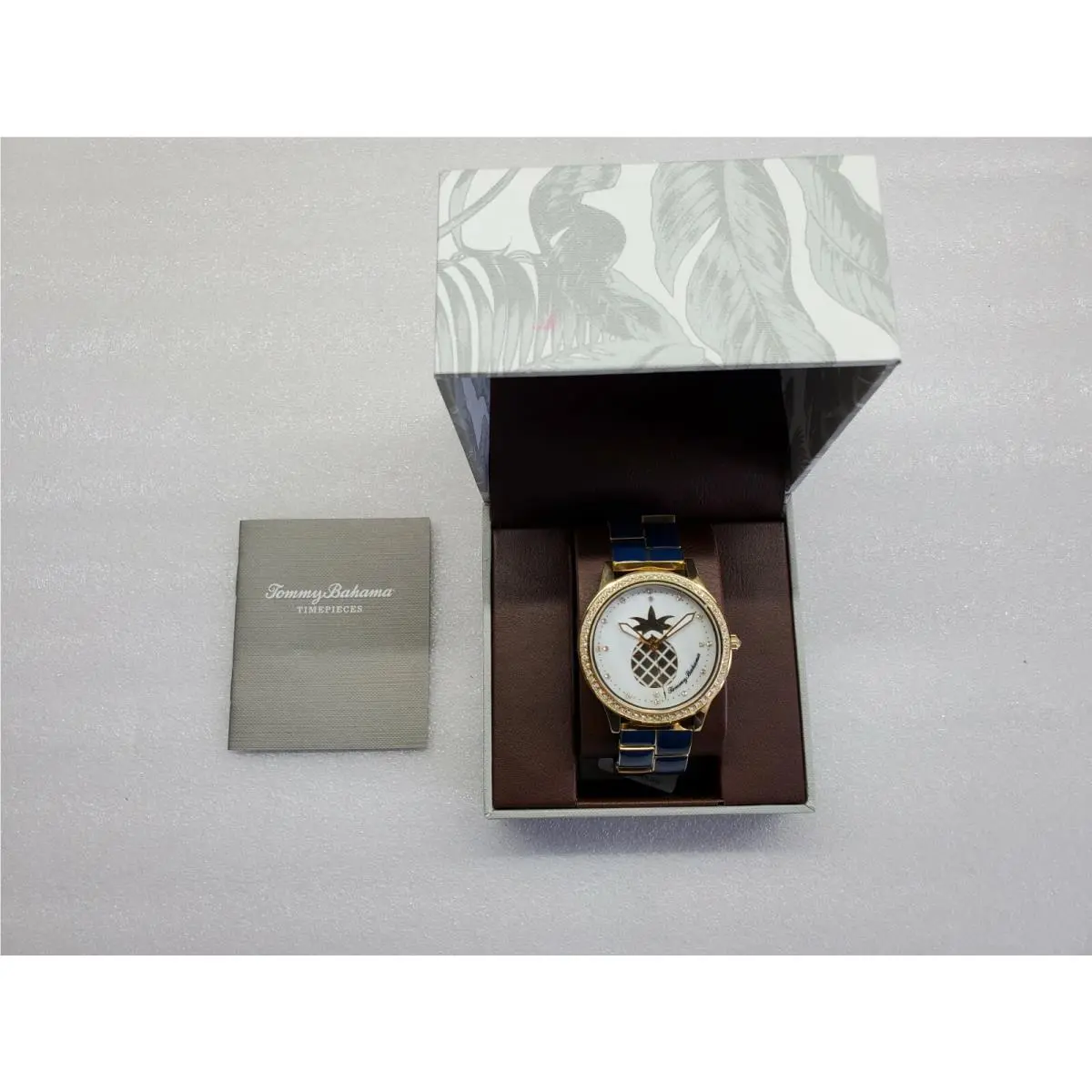White Dial Blue Ceramic Gold St.steel Women`s Watch TB00028-03 by Tommy Bahama
