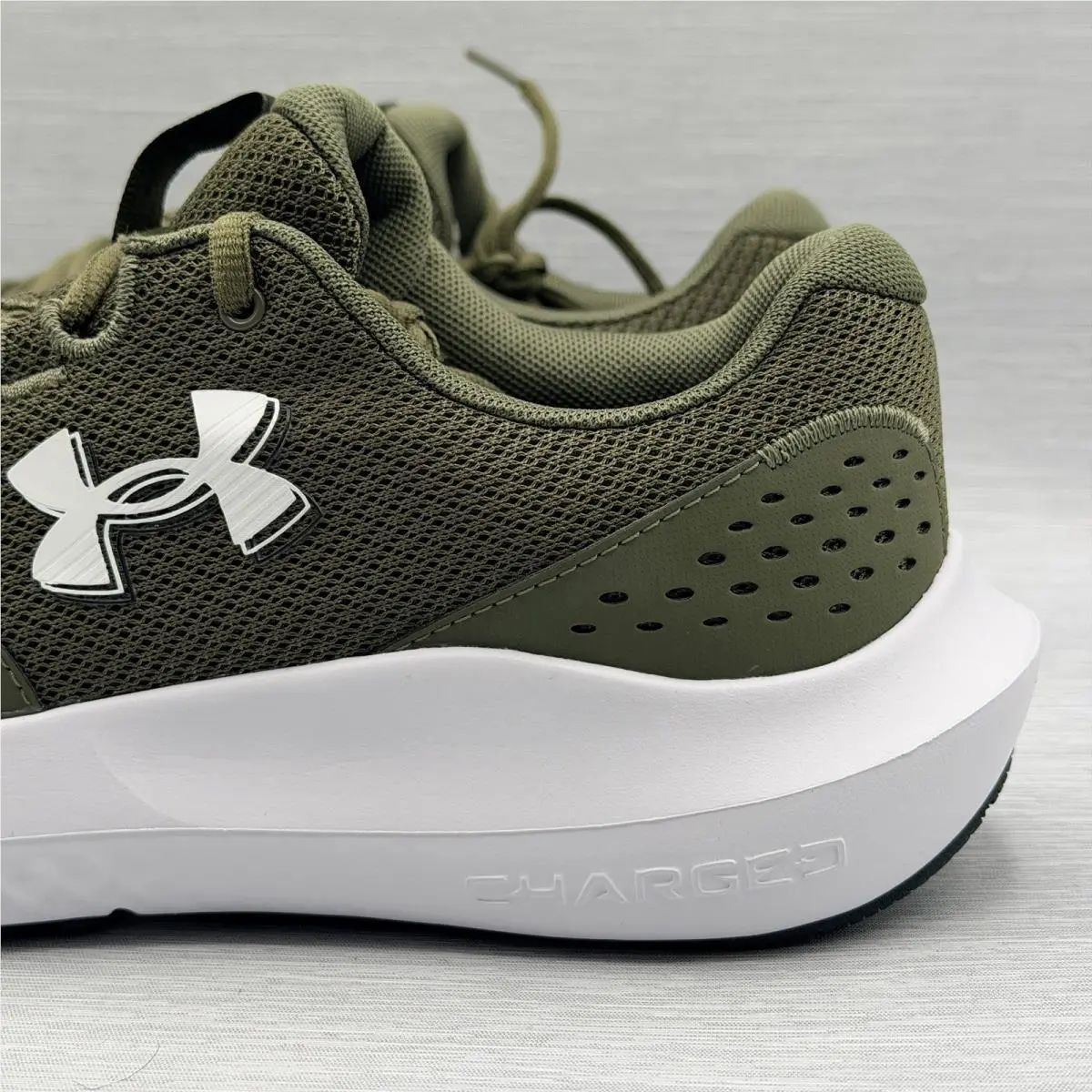 Under Armour shoes - Under Armour Surge - Surge - 3027000 - Green 1