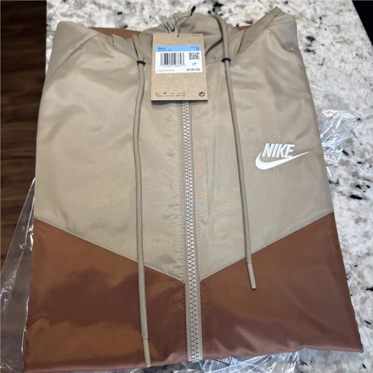 Nike clothing - Nike Sportswear Windrunner Hooded Jacket - DA0001-281 - Light British Tan (UPC: 0197600198623) 1