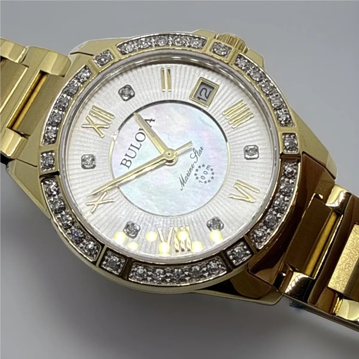 Bulova Marine Star 98R235 33mm Womens 41-Diamond Mop Date Gold Tone Watch