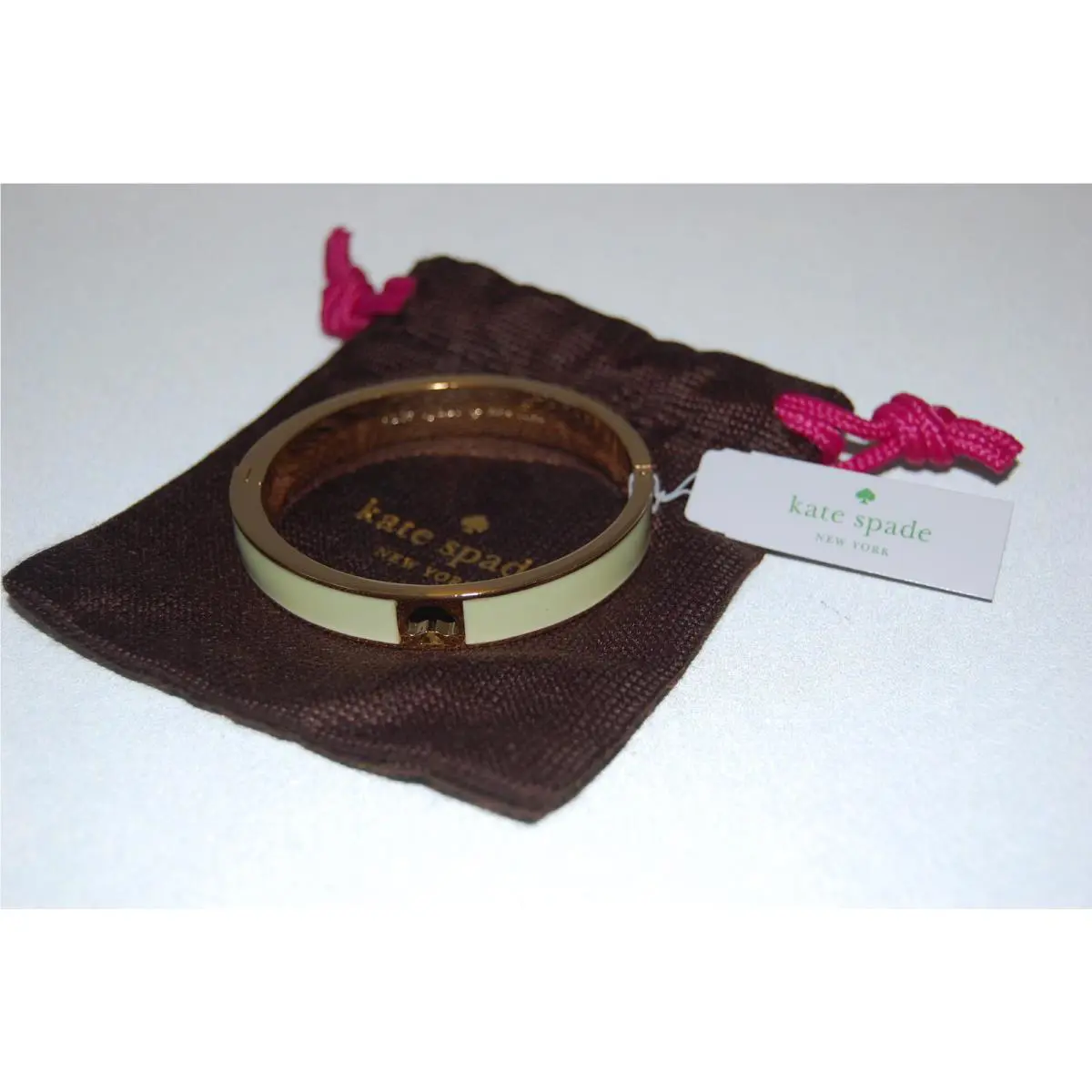 Kate Spade Cream Gold Hole Punch Spade Bangle Bracelet