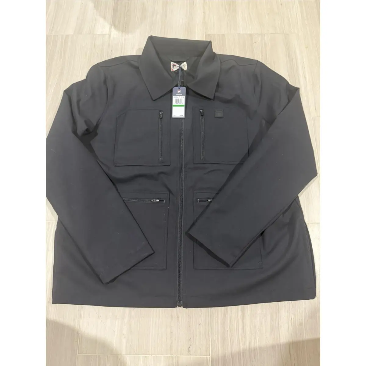 Men`s Fila Black 4 Pocket Tour Tennis Jacket. Large