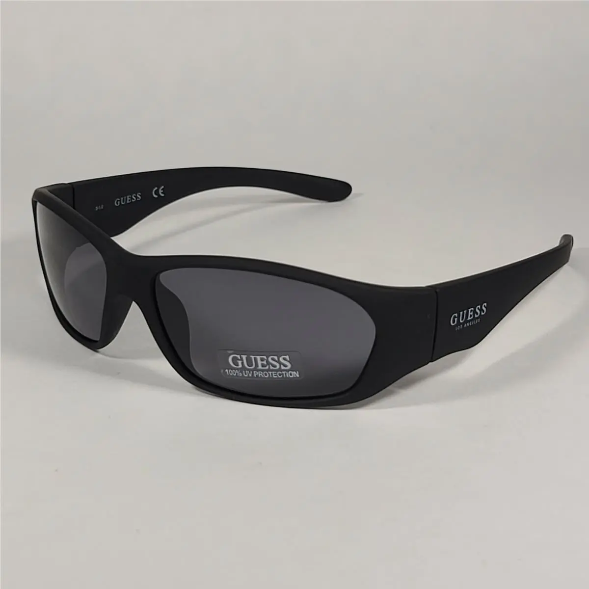 Guess GF4010 02A Small Wrap Sunglasses Matte Black Frame Gray Lens