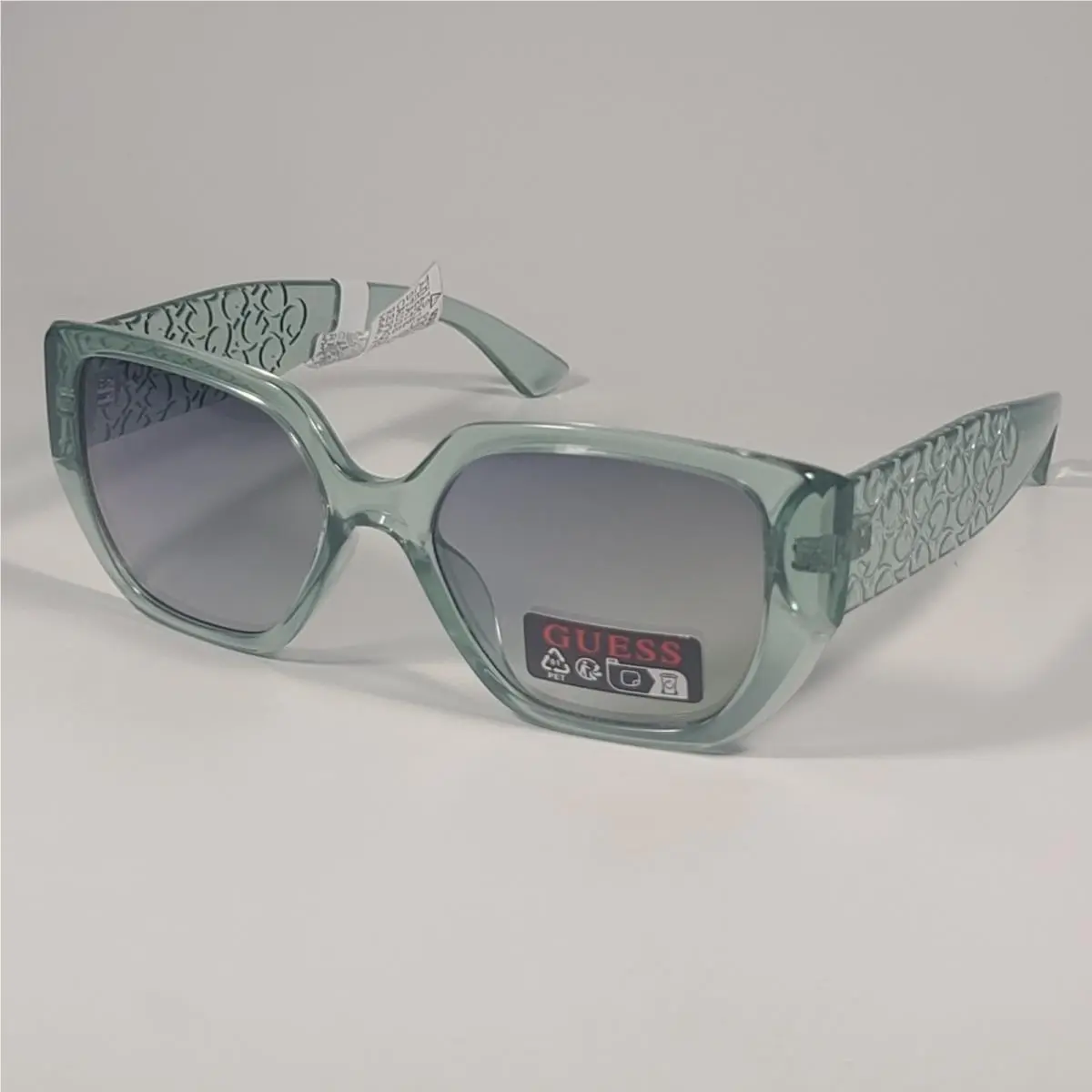 Guess GO00047 93X Cat Eye Sunglasses Clear Green Frame Gray Green Lenses 54mm