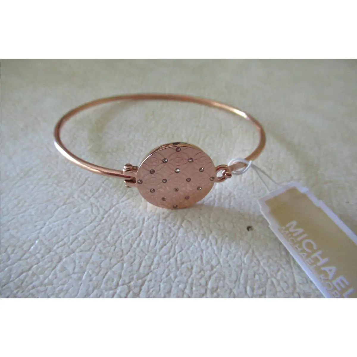 Michael Kors Heritage Monogram Disc Bangle Rose Gold Tone Bracelet-$115