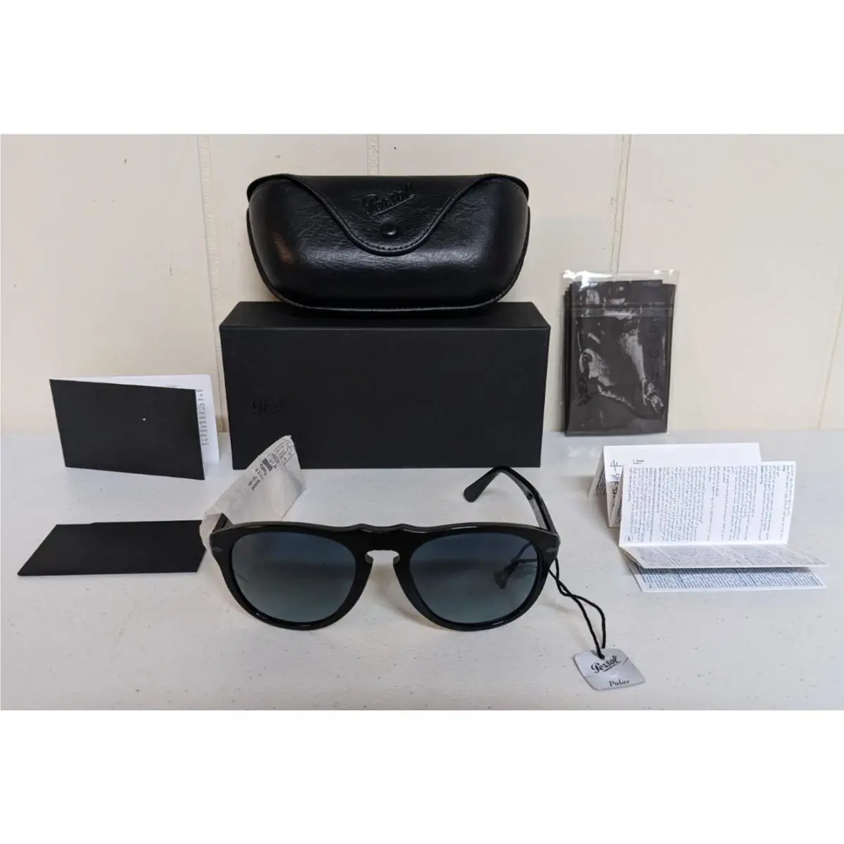 Persol PO0649NE Total Black Arrow Sunglasses Blue Polarized Glass Lenses