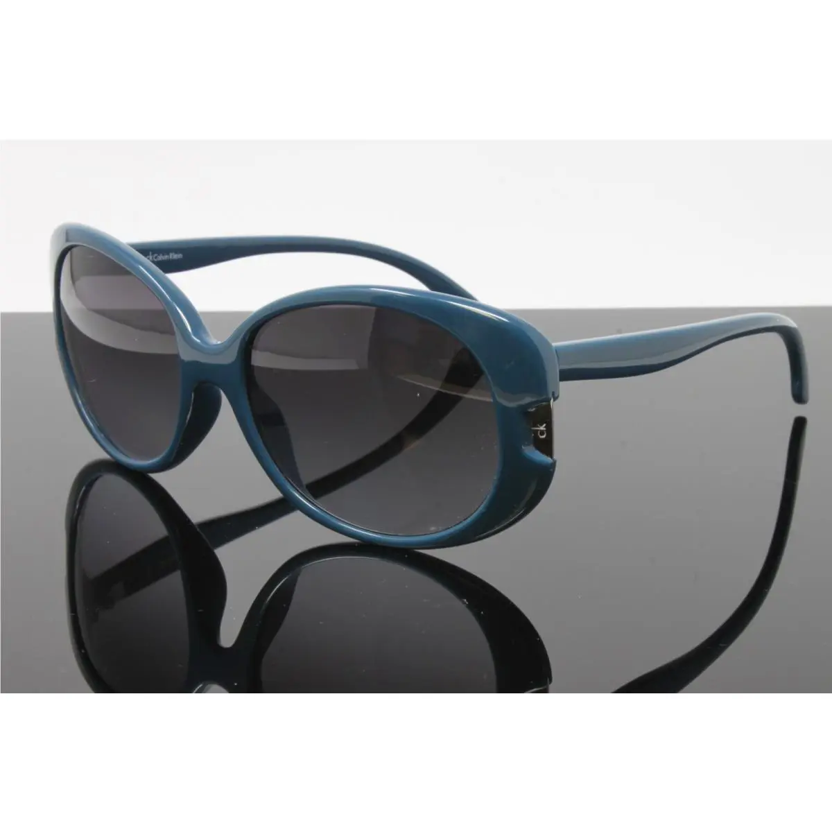 CK Calvin Klein Women`s Sunglasses CK3136S 279 Petrol 56mm Grey Lens
