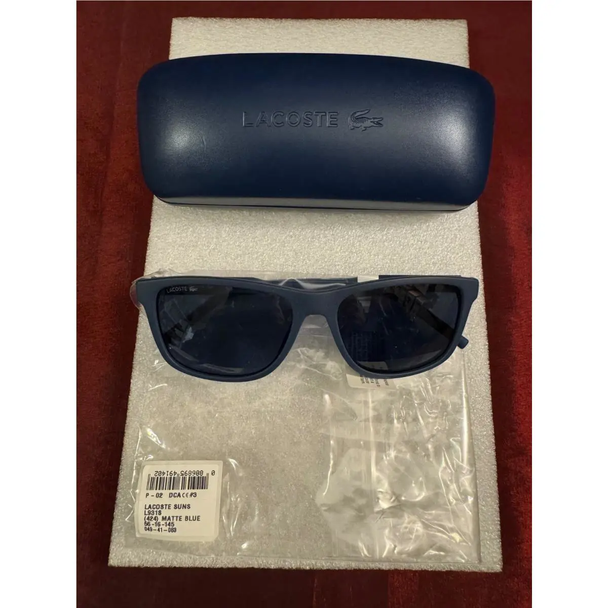 Read Lacoste Marchon L931S Blue Rectangular Sunglasses 56-16-145