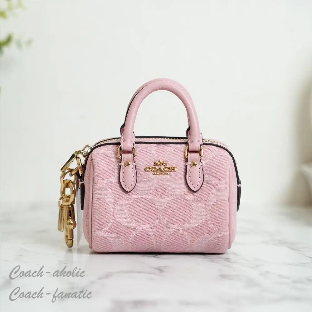 CEU38 Mini Rowan Bag Charm In Signature Denim Gold/light Pink by Coach