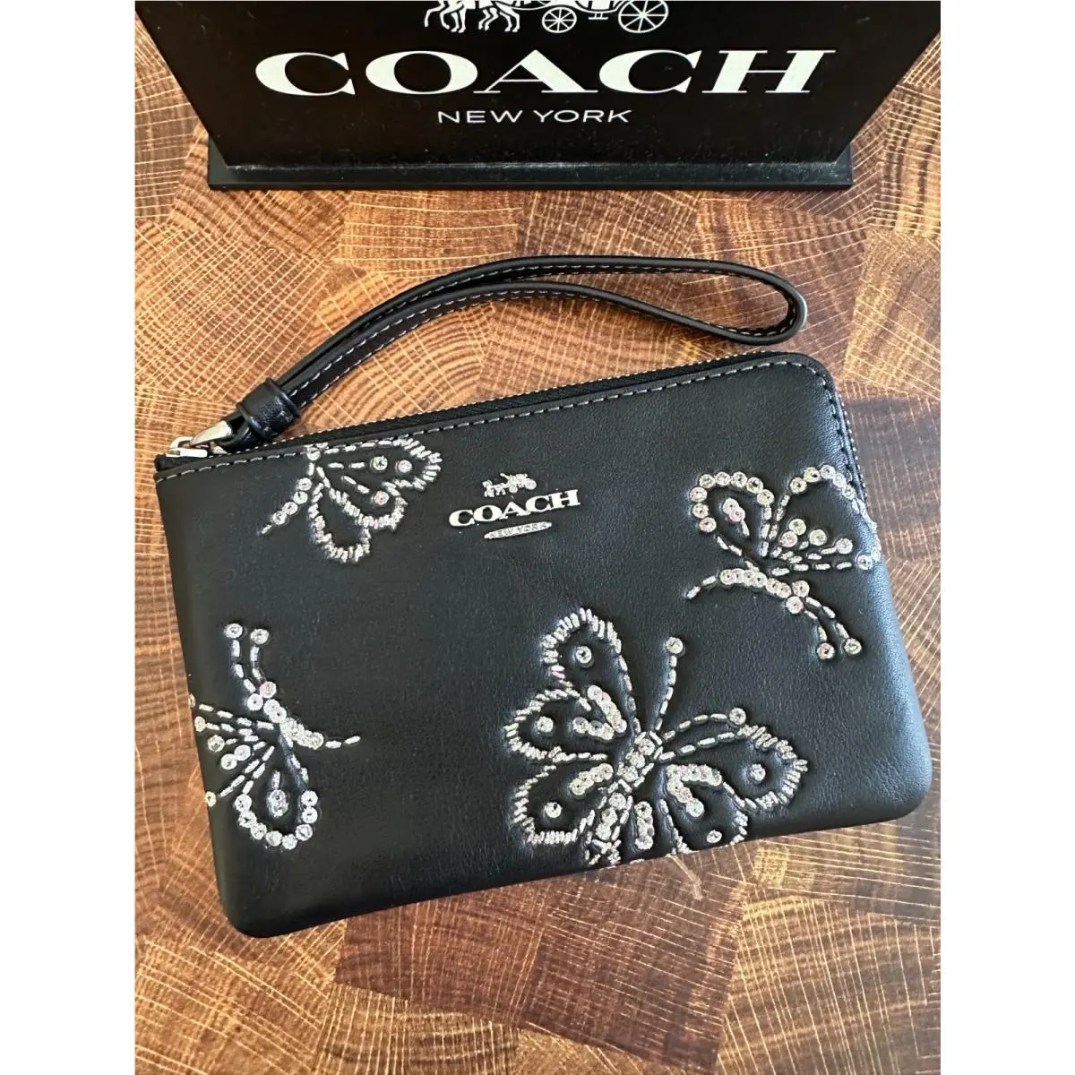 BN Coach Corner Zip Wristlet with Sparkly Butterfly Print CCJ72