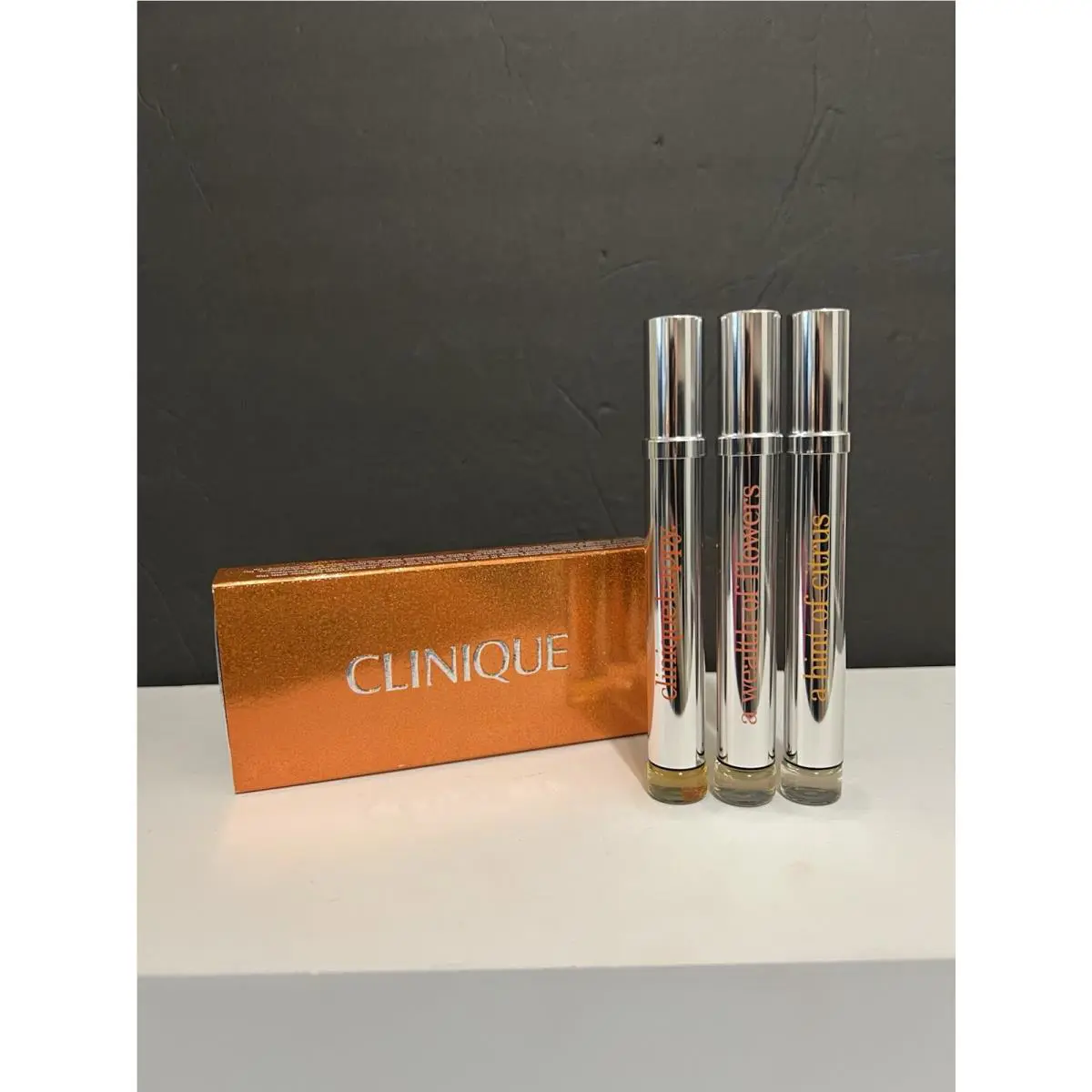 Chords Of Clinique Happy Hint of Citrus Wealth of Flowers Happy Roll-on