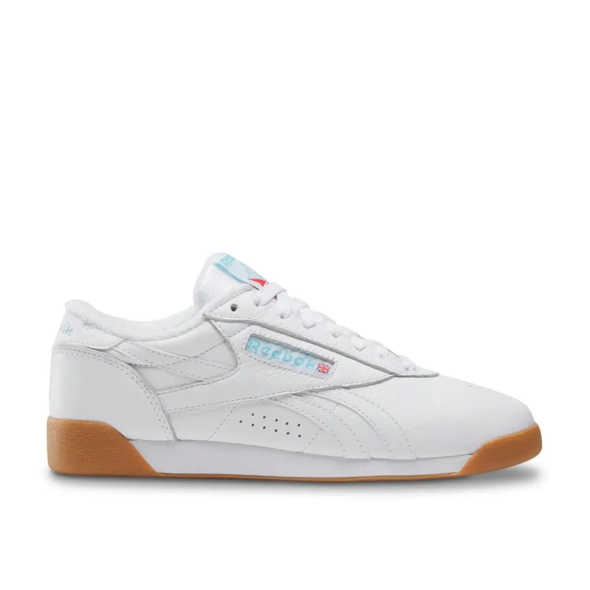 Woman`s Athleisure Reebok Freestyle Lo Sneaker - White