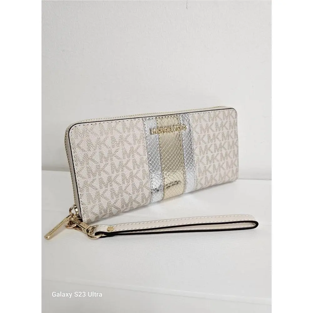 Jet Set Travel Large Travel Logo Continental Wristlet Wallet Pale Gold by Michael Kors