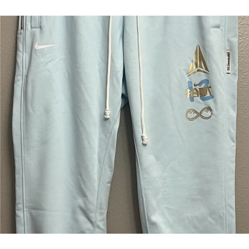 Nike clothing - Nike Standard Issue Ja Morant Basketball Jogger Pants - FZ3300-474 - Glacier Blue (UPC: 196976636531) 1