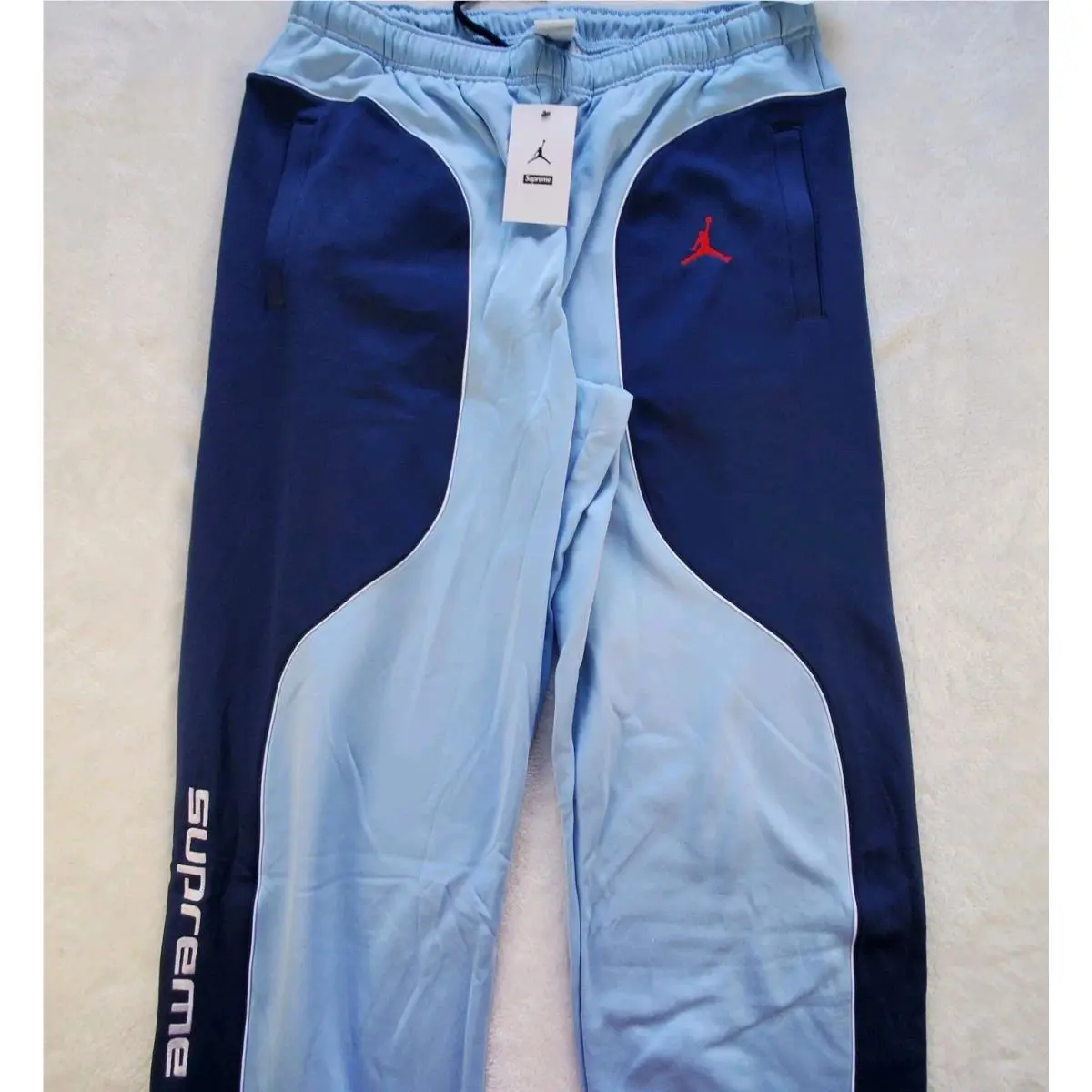 Nike clothing - Supreme x Jordan Track Pant - HF0832-436 - Blue (UPC: 197599213451) 0