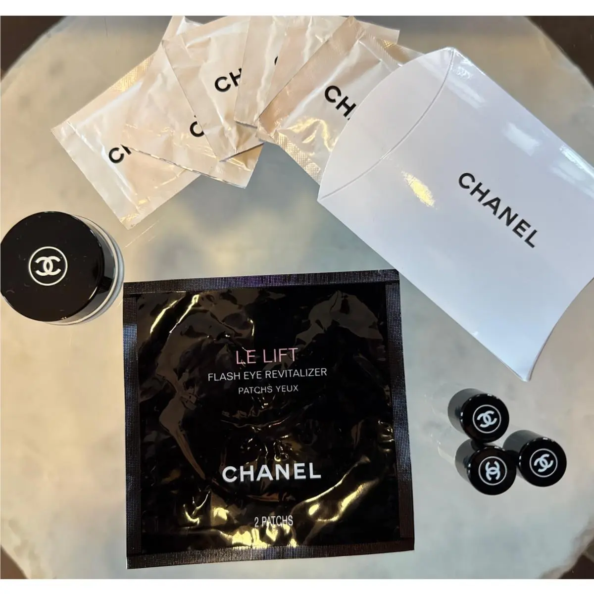 Chanel Travel Set: 1 Le Lift Eye Mask 4 Glass Dram Jars 6 Cleansing Towelettes