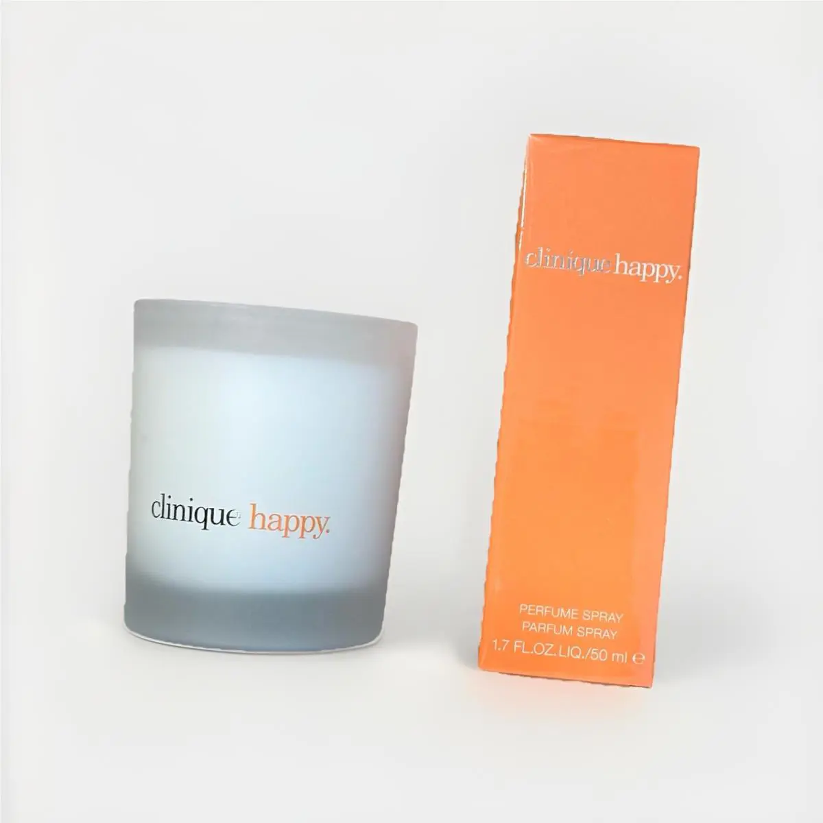 Happy by Clinique Bundle - Medium Parfum Spray 1.7 Oz 50 ML + Large 7 Oz Candle