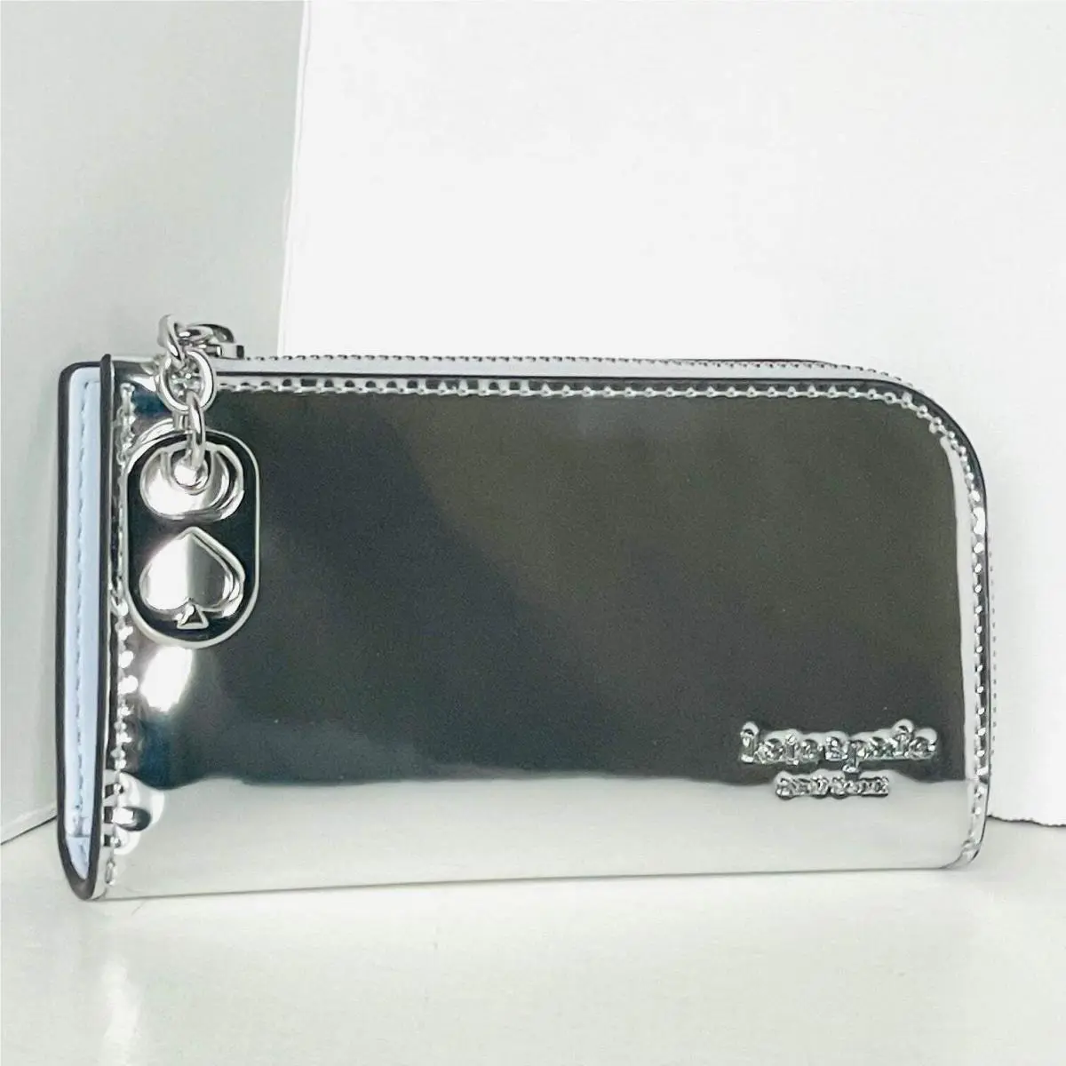 Kate Spade Devin Small Bifold Wallet Silver Patent Leather Zip