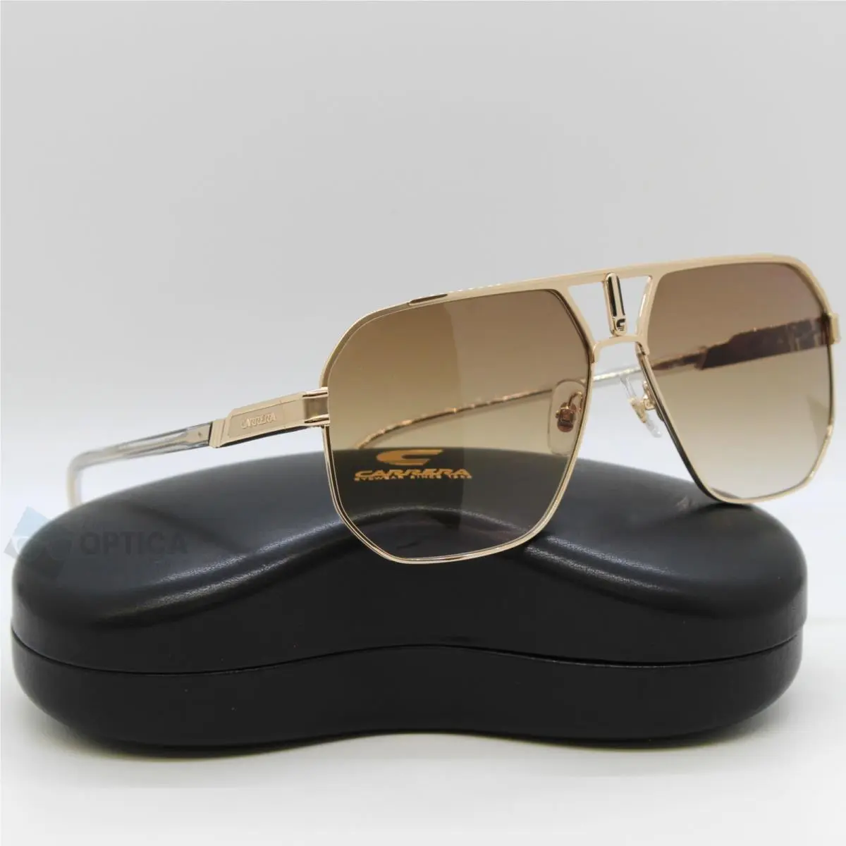 Carrera 1062/S Sunglasses Gold Metal Navigator / Brown Gradient Lens - J5G