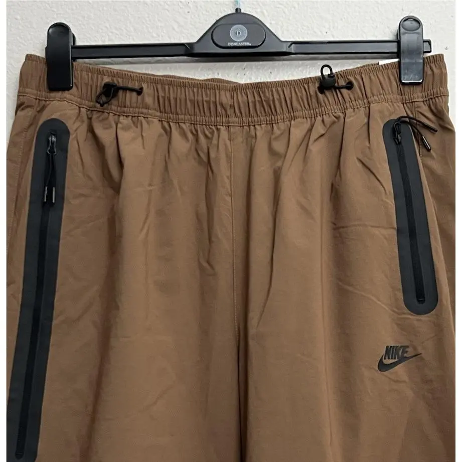 Nike clothing - Nike Tech Woven Oversized Pants - HM7158-235 - Mosswood Brown (UPC: 198484380821) 0