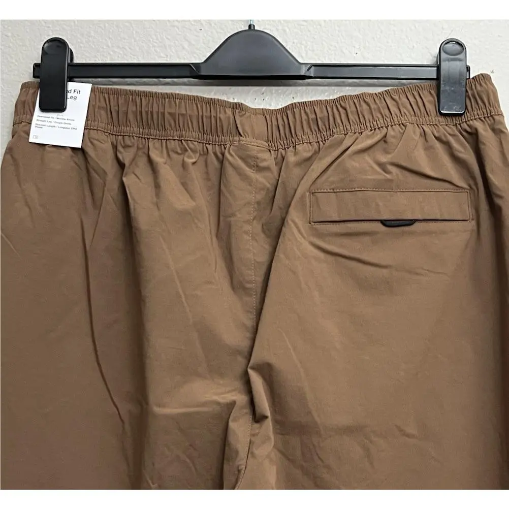 Nike clothing - Nike Tech Woven Oversized Pants - HM7158-235 - Mosswood Brown (UPC: 198484380821) 4