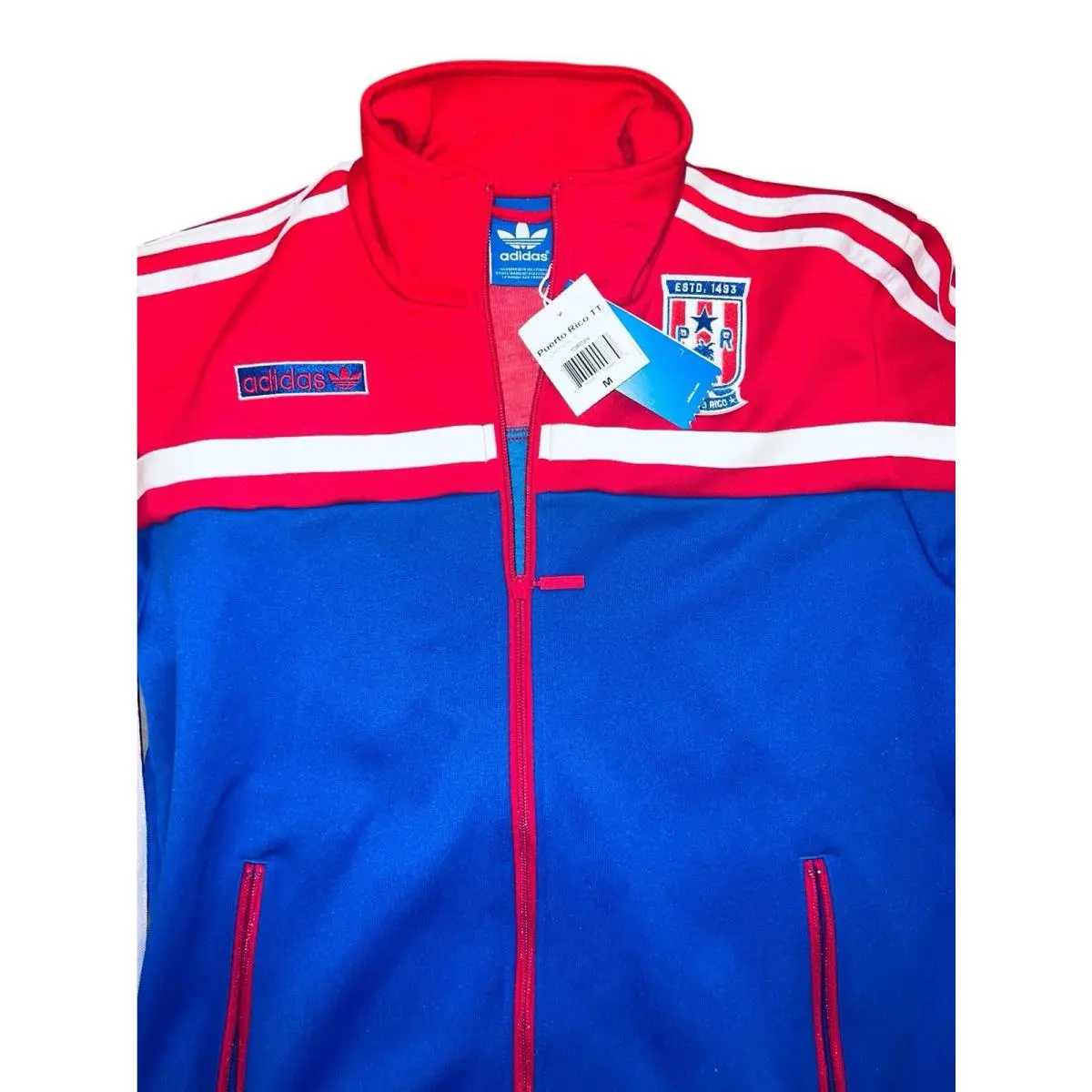 Adidas clothing - red, blue, white (UPC: 886037099879) 1