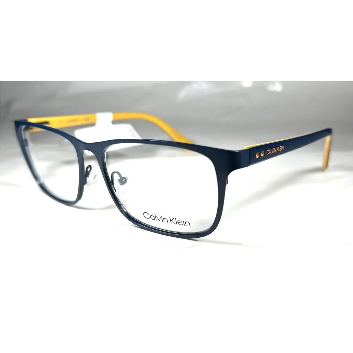 Calvin Klein CK19302 410 Eyeglasses Frame Navy Blue Yellow 19302 Size: 54-15-140
